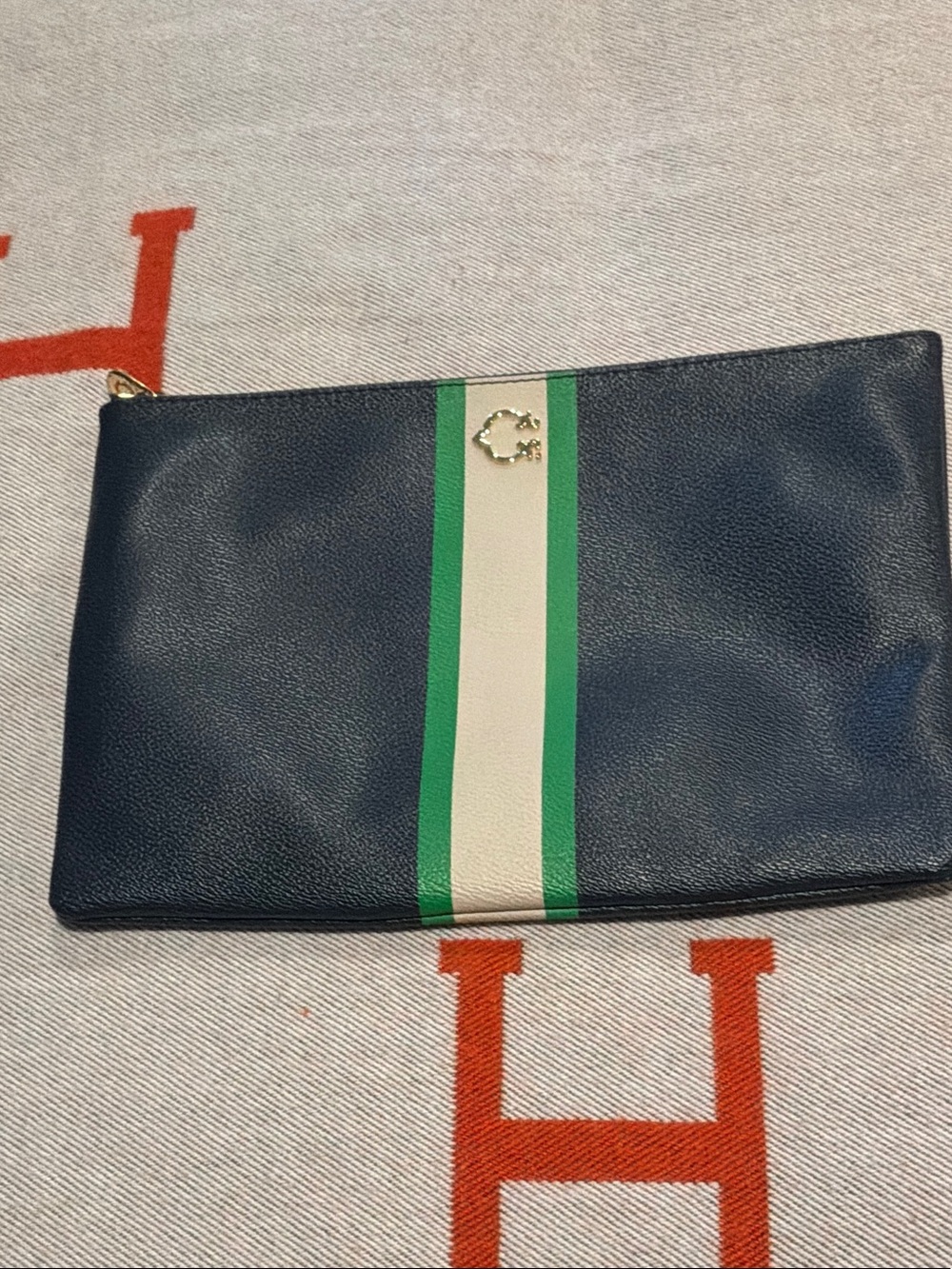 C. Wonder Navy Zip Cosmetic Pouch with Green and Cream Center Stripe